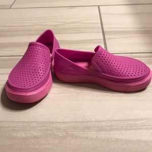 Crocs slip ons.